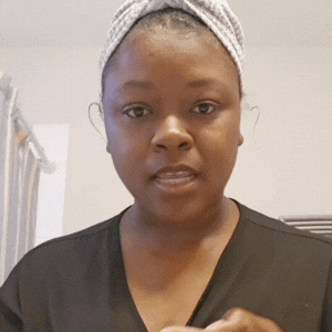 Customer showing how to use VOUEE SPF30 Moisturiser for melanin-rich skin no white cast - Step 2