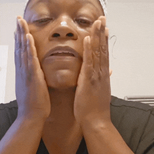 Customer showing how to use VOUEE SPF30 Moisturiser for melanin-rich skin no white cast - Step 3