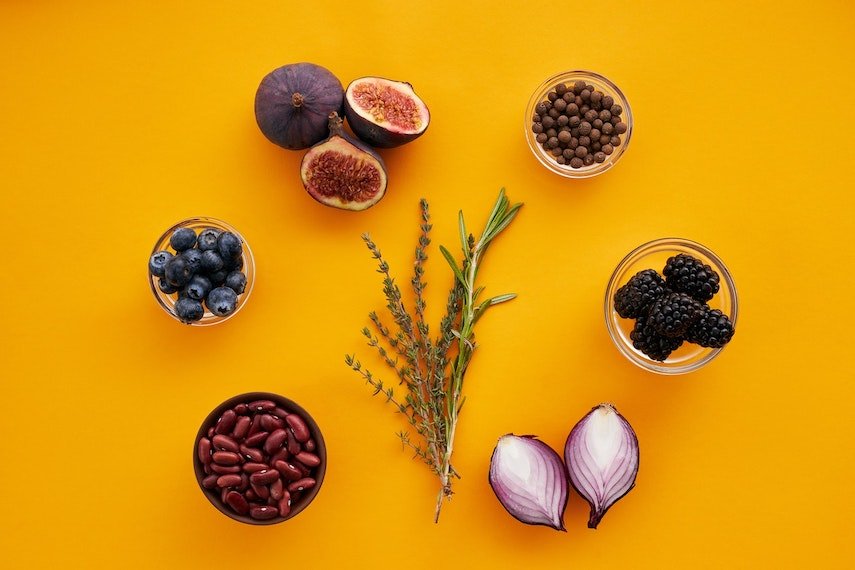 Radiant Skin through Nutrition - photo of fruits and nuts on a yellow background